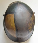Top of M16 helmet worn paint and rust