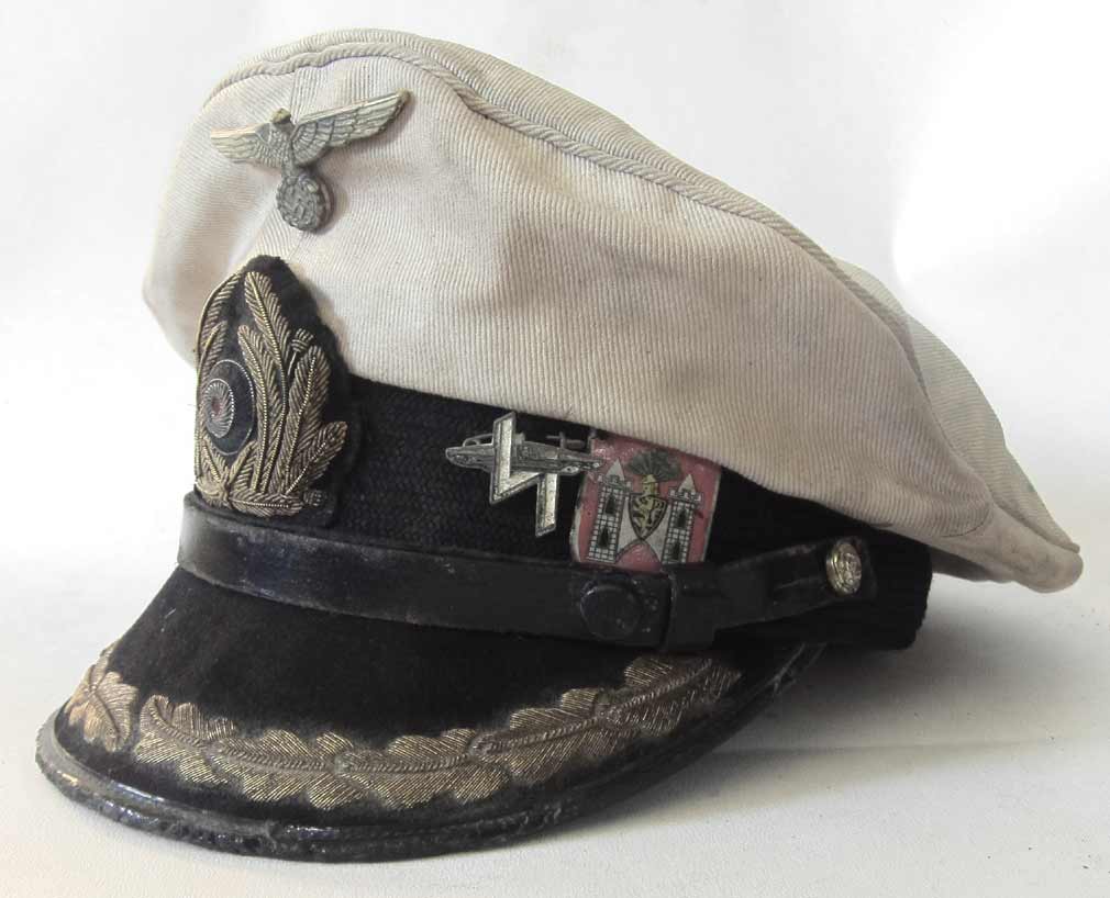 German U-Boat Kreigsmarine Captains Peaked cap with 70+ years of heavy ageing and very off-white top. As worn by the Korvettenkapitän of U-156 Werner Hartenstein.