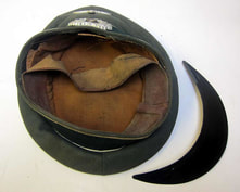 Inside of cap with replacement peak.